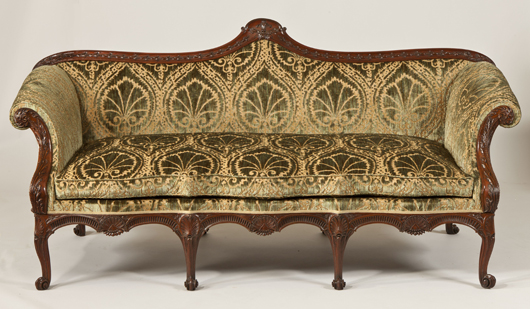 This carved fustic and satinwood sofa, circa 1758-65, will be on the stand of London furniture dealers Apter Frederick at the International Fine Art and Antique Dealers Show in New York from Oct. 25 to 31, where it will be priced at $850,000 (£550,000). Image courtesy Apter Frederick.